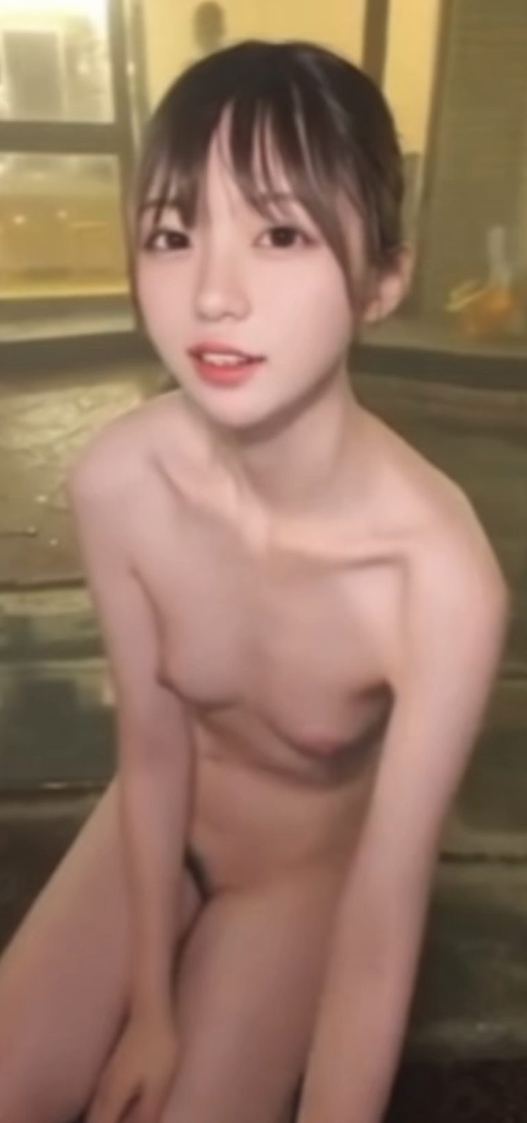 Japanese idol-style adult woman in a private nude onsen selfie video